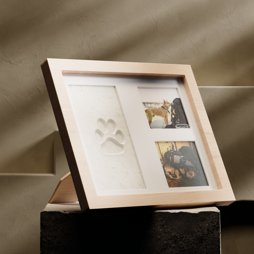 Framed artwork on a stand with a neutral background